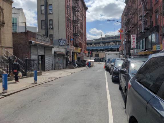 Eldridge Street midblock looking south between Canal and Division in 2019. Eldridge Street Museum left, 7 Eldridge, scene of the murder, right.
