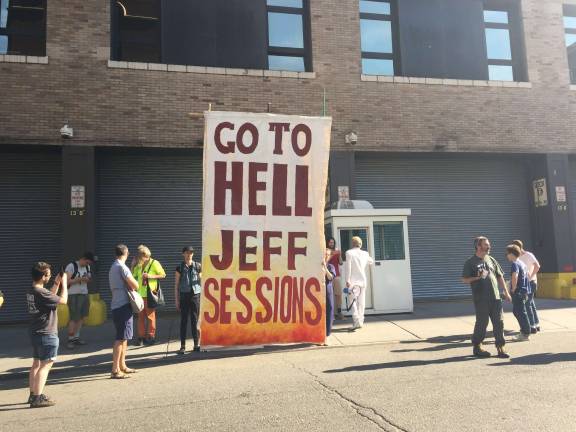 Demonstrators denounced Attorney General Jeff Sessions for his role in the country's immigration policy. Photo: Natasha Roy