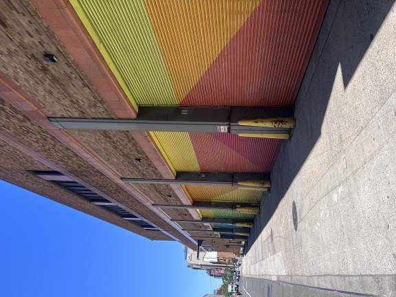One member of the Publicolor leadership team told <i>Our Town Downtown</i> that a completed section of “Fractured Spectrum” has given the community a “boost in morale.”