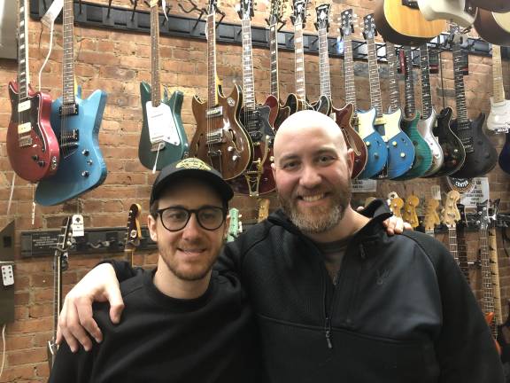 Siblings Shawn Gorelik (l.) and Frank Gorelik (r.) opened Brothers Guitar Shop on East 84th Street in 2020. It’s one of three local businesses the entrepreneurs own and operate on the Upper East Side.
