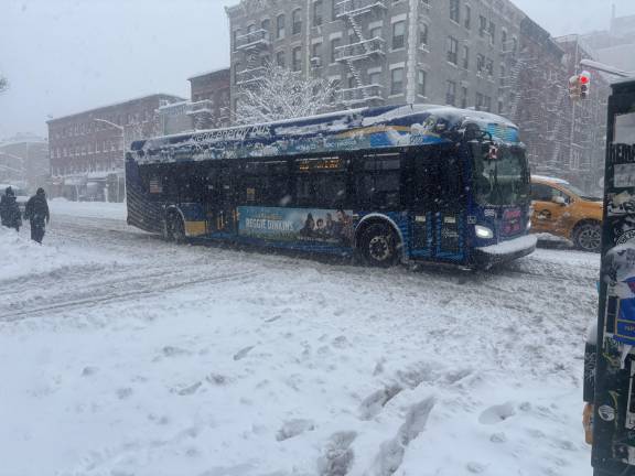 MTA was able to keep subways and buses, such as this one making its way up First Ave., running throughout the blizzard on Feb. 22-23.