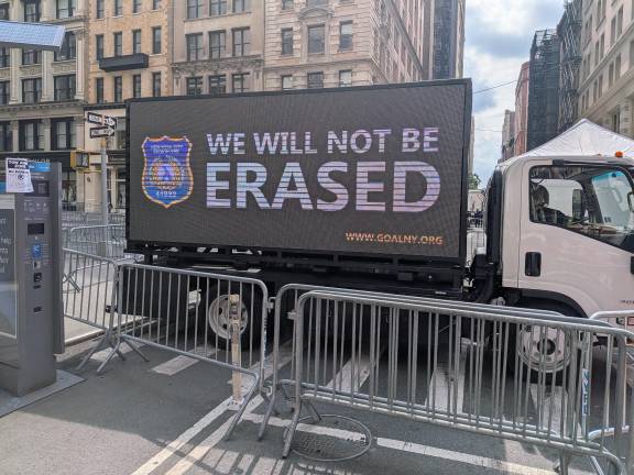 Gay Officers Action League sign truck at NYC Pride March from which uniformed officers have been banned from marching.