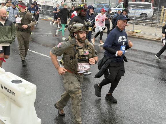 Runners on Hamilton Avenue in Brooklyn, soon to enter the Battery Tunnel to Manhattan.