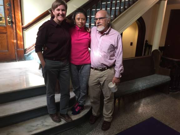Senior Pastor K Karpen (right) with Debora Barrios (center) and Associate Pastor Lea Matthews (left) inside of St. Paul and St. Andrew United Methodist Church. Photo: Stephan Russo