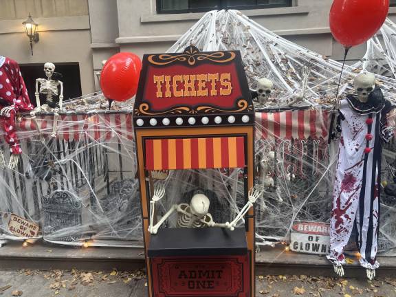 A scary Halloween ticket booth outside an establishment on E. 63rd St., between Park Ave. and Lexington Ave. Note: Beware of Clowns!