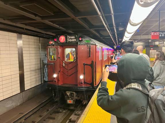 The first-ever NYC Transit nostalgia train to a Mets Opening Day had cellphone cameras working overtime as it pulled into Hudson Yards station to start its journey to Citi Field on April 4.