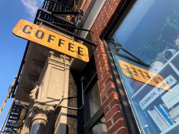 Dreamers Coffee sells books supplied by Common Books, another LES/Chinatown business. Photo: James Poethen