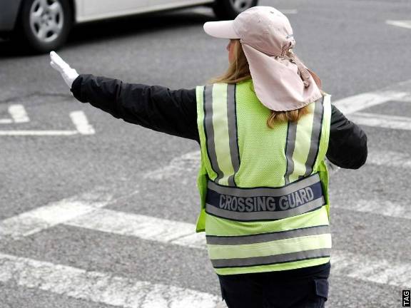 The NYPD has struggled to fill budgeted school crossing guard positions in some precincts. Photo: Thomas Altfather Good, via flickr