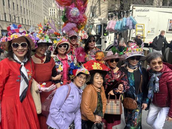 This flower-bedecked gang came in from Flushing for the Easter Parade on Fifth Avenue.