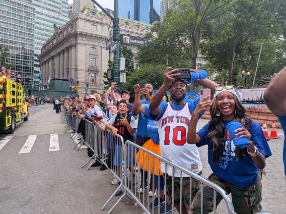 Knicks parade fans await their heroes on Battery Place.