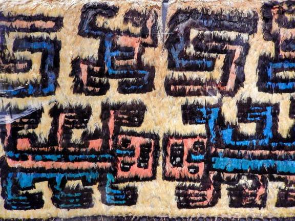 Precious colorful feathers were woven into resplendent robes by craftspeople in the Ancient Americas. Photo: Adel Gorgy