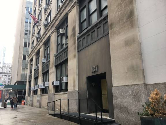 News of a 60-story tower planned for 137 Centre Street surfaced last year. Advocates are calling for a conversion of the city-owned building to affordable housing. Photo: Rui Miao