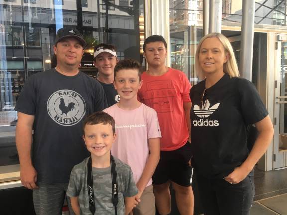 The Turner family, from Heber Valley, Utah, outside the Empire State Building. Photo: Jaden Statenstein