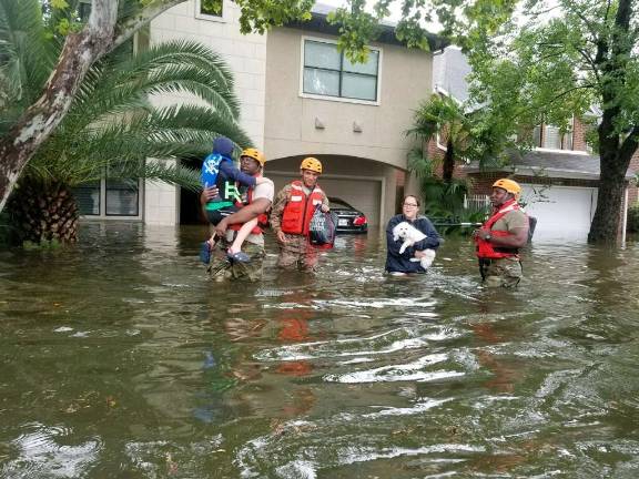 Texas National Guard soldiers arrive in Houston, Texas to aid citizens in heavily flooded areas from the storms of Hurricane Harvey. Photo: Lt. Zachary West , 100th MPAD, via flickr