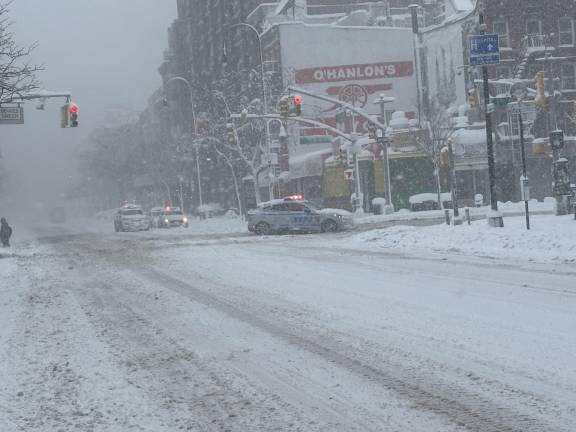 NYPD cruiser answers a call in the East Village.