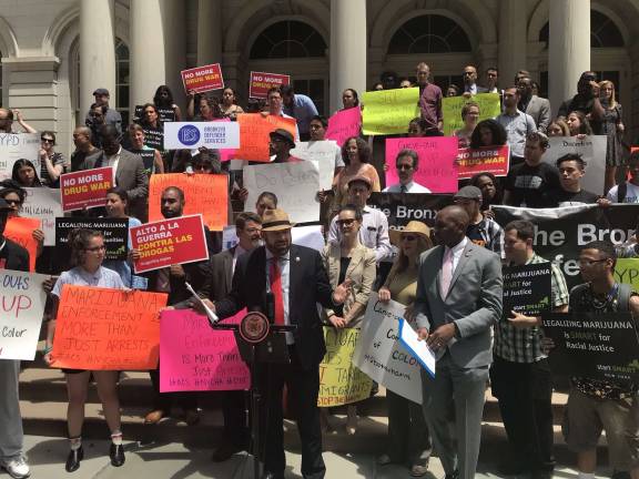 Members of the City Council's progressive caucus and other cannabis policy reform advocates gathered on the steps of City Hall June 18 to critique the NYPD's new marijuana enforcement policy. Photo: City Council Member Rory Lancman, via Twitter.