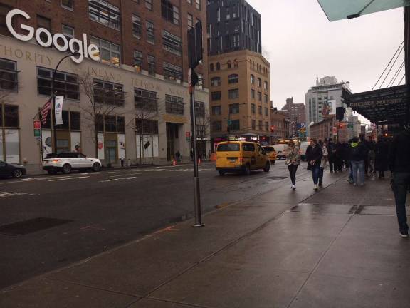 Google bought the block-long former Port Authority building on Eighth Avenue in 2010. Its purchase, this month, of the Chelsea Market building on Ninth Avenue gives the tech giant a sizeable footprint in Chelsea. Photo: Michael DeSantis