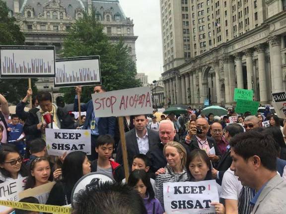 Opponents of Mayor Bill de Blasio's proposal to overhaul admissions to specialized high schools held a rally at City Hall June 10. Photo: State Senator Marty Golden, via Facebook