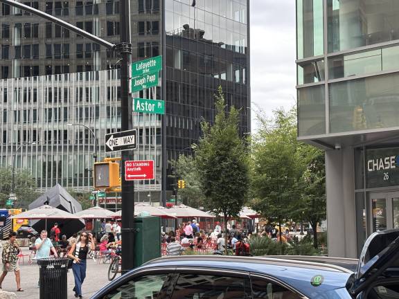 The iconic Astor Place Cube can be seen in the background left, which is where a hit-and-run biker slammed into the back of another bike during Summer Streets on Aug. 16. Social media users are trying to find the offending biker, who drove off without stopping.
