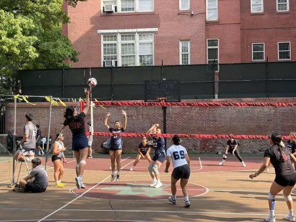 Chinese Volleyball thrills Lilian D. Wald Playground where 6-Woman teams competed.