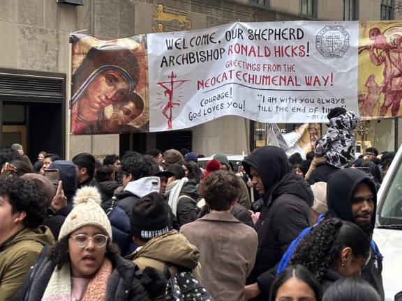 Many brought colorful banners the streets outside St. Patrick’s to welcome new Archbishop Hicks to New York.
