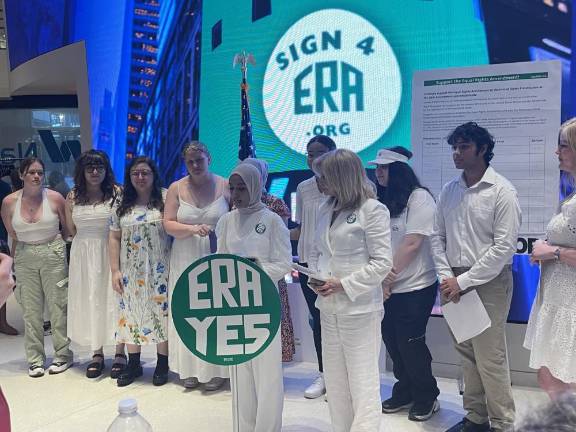 Asia Khan, student founder of the Sign4ERA petition, speaks at a press conference.