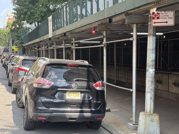 Up to 40 vehicles with “MD” plates still park in spaces reserved for “doctors licence plates only” [see sign] outside the shut down Beth Israel Hospital on E. 16th St. and surrounding blocks. Mount Sinai closed the hospital in April. No patients are inside.