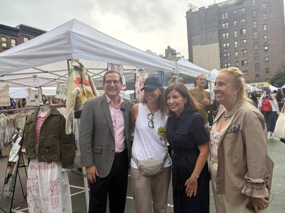 (from left) State Assembly member Micah Lasher, Bazaar Executive Director Dara Lehon, Gov. Kathy Hochul and City Council member Gale Brewer pose for a photo together.