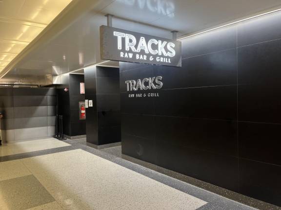 Distinctive signage notes entrance to the only dining venue at Grand Central Madison.