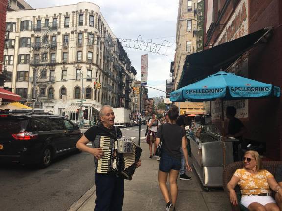 A little street music outside Caffe Roma.