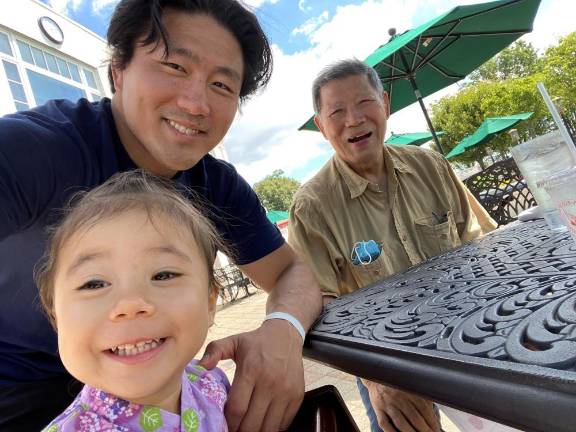 Shintaro Higashi with his daughter and his father, Nobuyoshi, who founded the dojo in 1963. Photo courtesy of Shintaro Higashi