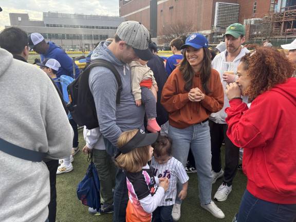 Carlina Rivera (blue cap), at the opening-day parade of the Peter Stuyvesant Little League this spring, has resigned her City Council seat to head up the NYS Association for Affordable Housing.