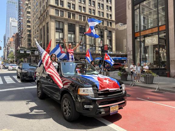 Cuban Day Parade brings multitudes to Madison Avenue. Red, white and blue forever!