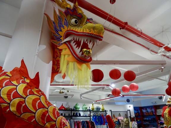 One of the many dragons that hang from the ceiling and decorate the Pearl River store at Chelsea Market. Photo: Clarrie Feinstein