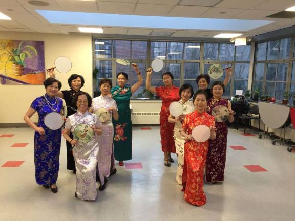 A fashion show during an intercultural festival shows how the Lenox Hill Neighborhood House celebrates diversity.