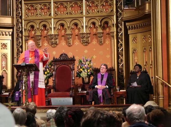 Cardinal Timothy M. Dolan speaks at an interdenominational service at Marble Collegiate Church on March 29. Marble's pastor, Dr. Michael B. Brown, is to Dolan's right. Photo: Michael Garofalo