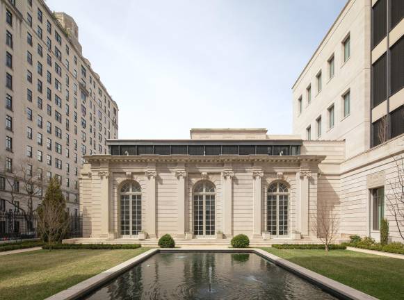 View from 70th Street Garden looking west to Reception Hall, The Frick Collection, New York.