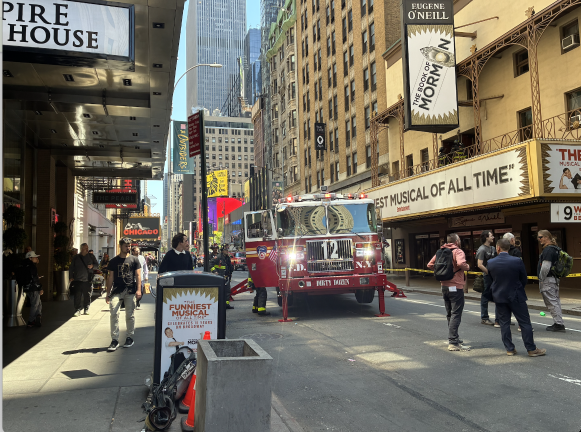 Firefighters arriving at the scene of the Eugene O’Neill Theater where fire erupted on the morning of May 4.