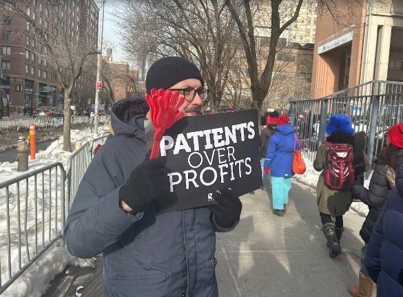 A retired pediatrician joined the picket line outside Mount Sinai West on Feb. 6.