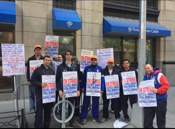 Democratic Socialist and political newcomer Patrick Bobilin, second from left in front row, with striking electrical workers at a Time-Warner facility at 78th Street and Third Avenue earlier this year. He is challenging incumbent Ben Kallos to represent the Upper East Side. Photo: Pedro Cappacetti / IBEW Local No. 3