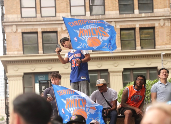 Police estimate two million Knicks crammed into downtown for the Knicks ticker-tape parade.