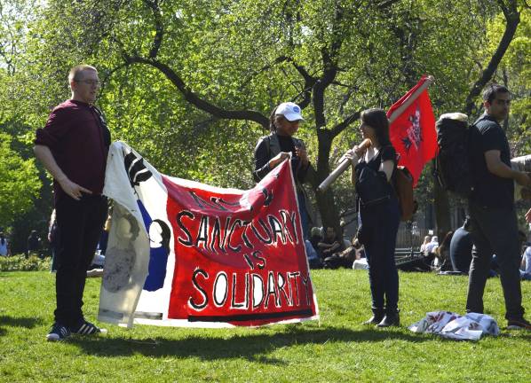 New York University students prepared for a rally and walk from Washington Square Park to Union Square following a May Day teach-out. Photo: Diamond Naga Siu