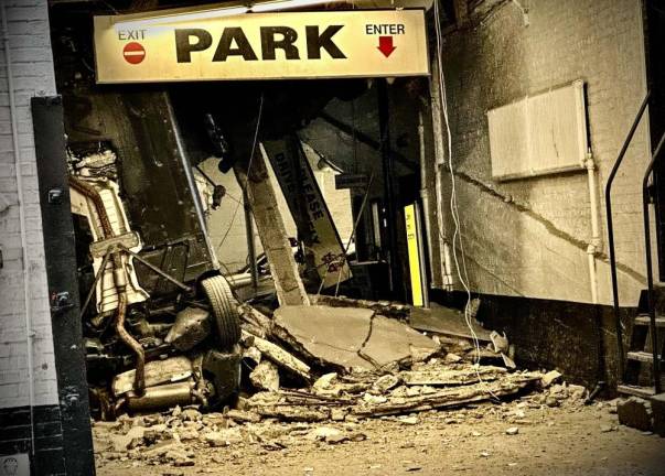 <b>The parking garage collapse on Ann Street on April 18th prompted a city wide inspection of all parking garages and the closure of two in downtown Manhattan.</b> Photo: Michael Appleton/Mayoral Photography Office