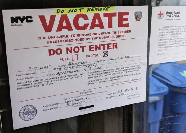 Partial vacate order for 409 E. 81st St. dated Nov. 12, 2025.