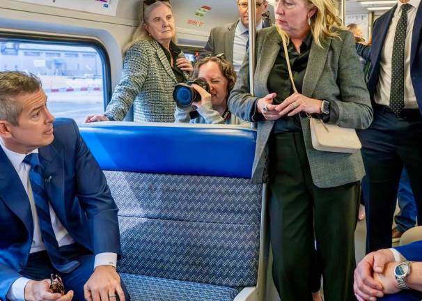 A few days after his critical remarks about the NYC subway system and congestion pricing, US DOT Secretary Duffy (left) rode Salt Lake City’s commuter train line and extolled how valuable transit was to that region.