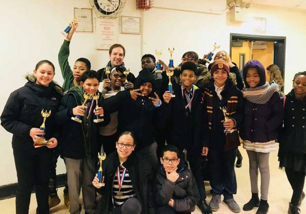 At the Middle School Tournament on Jan. 13 at the Washington Heights Expeditionary Learning School (WHEELS). &lt;saxo:ch value=&quot;226 128 168&quot;/&gt;Photo courtesy of NYCUDL