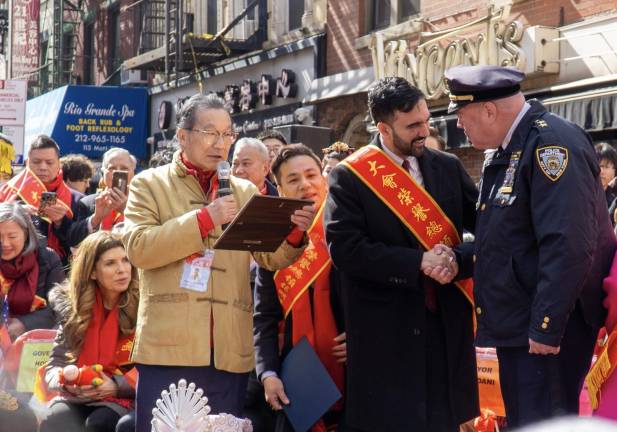 Steven Tin, Mayor Mamdani and Chief James McCarthy at the pre-Chinatown Parade ceremony.