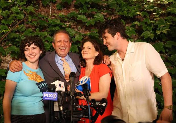 Brad Lander with his wife and children at Threes Brewing in Gowanus, Brooklyn, on election night.
