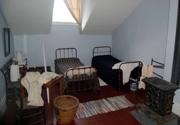 A paint conservator found that the servant bedroom was painted a light blue, perhaps to reflect light in the room, which was without the gas lighting present in the rest of the house. Photo courtesy of the Merchant&#x2019;s House Museum.