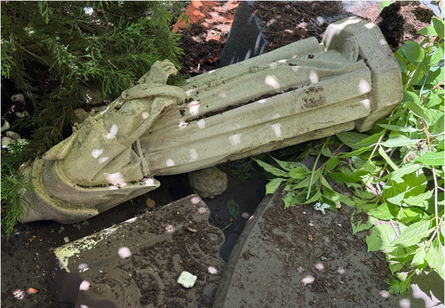 A vandal climbed a fence outside St. John the Baptist R.C. Church on West 30th St. around 4 a.m.